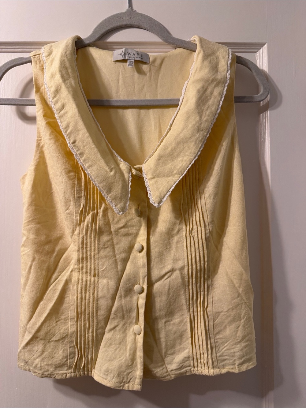 Wayf Pale Yellow Sleeveless Button-Front Top with Pleated Front